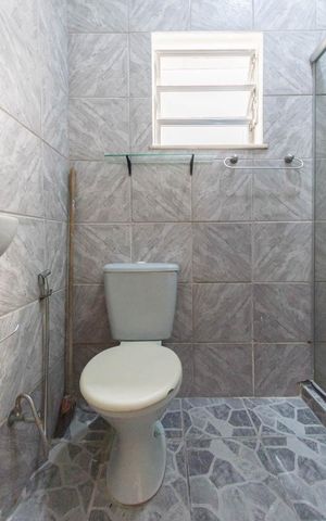 Casa à venda com 56m², 4 quartos e sem vagaBanheiro 1