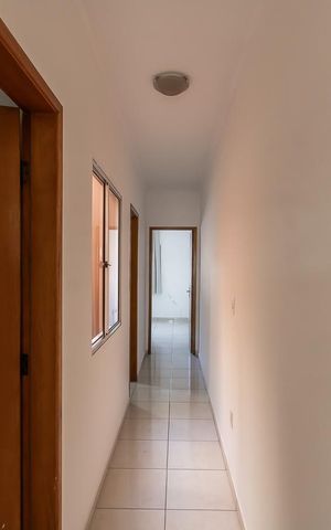 Casa à venda com 134m², 3 quartos e 2 vagas Casa à venda com 134m², 3 quartos e 2 vagasCorredor