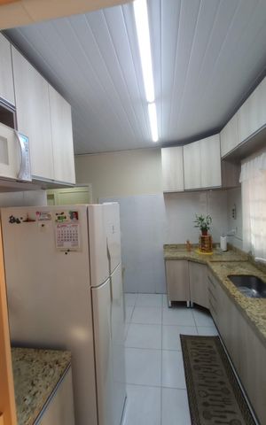 Casa à venda com 110m², 3 quartos e 2 vagas Casa à venda com 110m², 3 quartos e 2 vagasCozinha