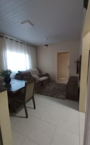 Casa à venda com 110m², 3 quartos e 2 vagas Casa à venda com 110m², 3 quartos e 2 vagasSala
