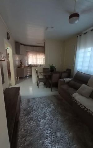 Casa à venda com 110m², 3 quartos e 2 vagas Casa à venda com 110m², 3 quartos e 2 vagasSala