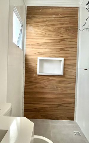 Casa à venda com 53m², 2 quartos e 1 vaga Casa à venda com 53m², 2 quartos e 1 vagaBanheiro