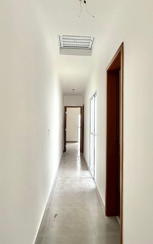 Casa à venda com 53m², 2 quartos e 1 vaga Casa à venda com 53m², 2 quartos e 1 vagaCorredor