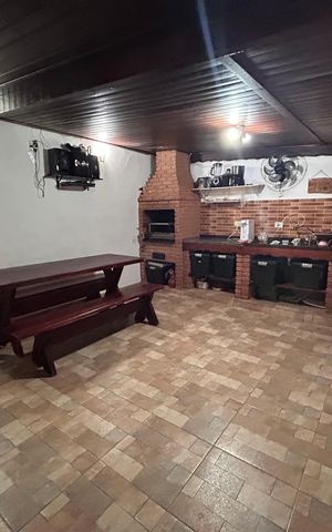 Casa à venda com 290m², 4 quartos e 2 vagasChurrasqueira