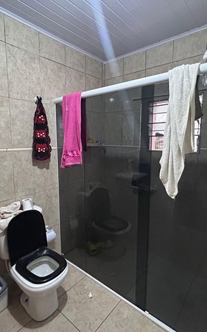 Casa à venda com 290m², 4 quartos e 2 vagasBanheiro da Suíte 2