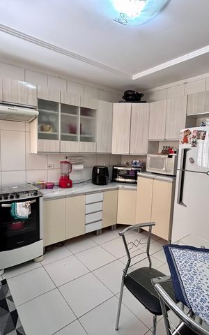 Casa à venda com 107m², 3 quartos e 2 vagas Casa à venda com 107m², 3 quartos e 2 vagasCozinha
