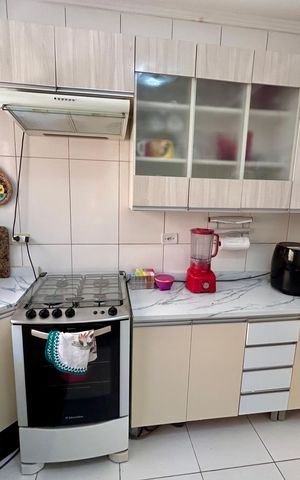 Casa à venda com 107m², 3 quartos e 2 vagas Casa à venda com 107m², 3 quartos e 2 vagasCozinha
