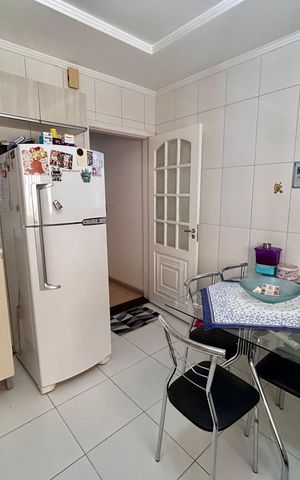 Casa à venda com 107m², 3 quartos e 2 vagas Casa à venda com 107m², 3 quartos e 2 vagasCozinha