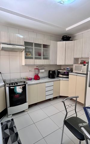 Casa à venda com 107m², 3 quartos e 2 vagas Casa à venda com 107m², 3 quartos e 2 vagasCozinha