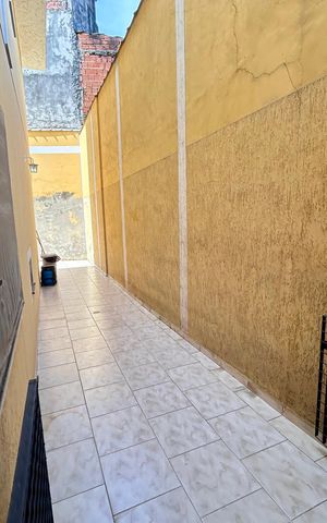Casa à venda com 107m², 3 quartos e 2 vagas Casa à venda com 107m², 3 quartos e 2 vagasCorredor
