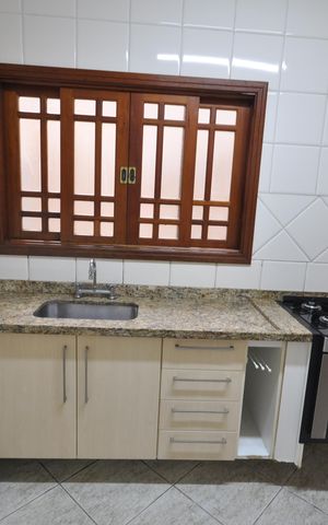 Casa de condomínio para alugar com 123m², 3 quartos e 2 vagasCozinha
