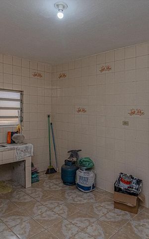 Casa à venda com 400m², 3 quartos e 4 vagas Casa à venda com 400m², 3 quartos e 4 vagasCozinhada casa 2