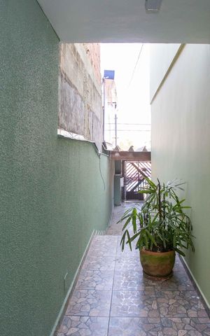 Casa à venda com 275m², 4 quartos e 2 vagasCorredor externo