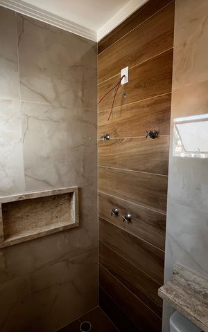 Casa à venda com 130m², 3 quartos e 3 vagasBanheiro da Suíte 1