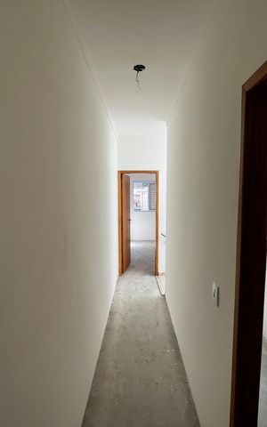 Casa à venda com 130m², 3 quartos e 3 vagasCorredor