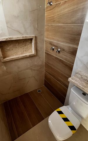Casa à venda com 130m², 3 quartos e 3 vagasBanheiro da Suíte 1
