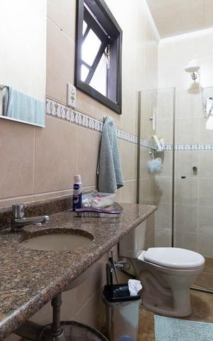 Casa à venda com 153m², 4 quartos e 3 vagas Casa à venda com 153m², 4 quartos e 3 vagasBanheiro da Suíte 1