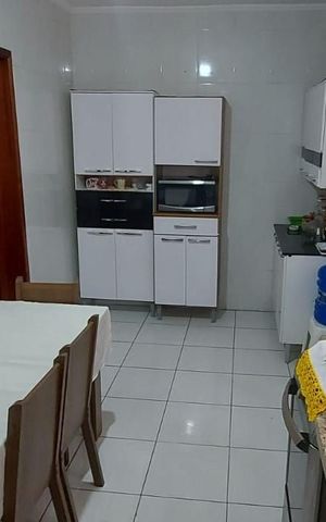 Casa à venda com 68m², 2 quartos e 2 vagas Casa à venda com 68m², 2 quartos e 2 vagasCozinha