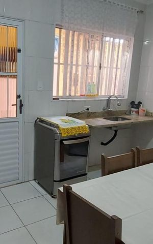 Casa à venda com 68m², 2 quartos e 2 vagas Casa à venda com 68m², 2 quartos e 2 vagasCozinha