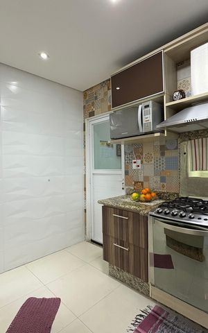 Casa à venda com 185m², 3 quartos e 2 vagas Casa à venda com 185m², 3 quartos e 2 vagasCozinha