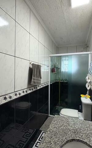 Casa à venda com 185m², 3 quartos e 2 vagas Casa à venda com 185m², 3 quartos e 2 vagasBanheiro da Suíte 1