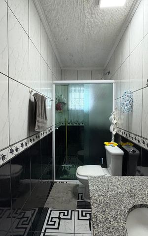 Casa à venda com 185m², 3 quartos e 2 vagas Casa à venda com 185m², 3 quartos e 2 vagasBanheiro da Suíte 1