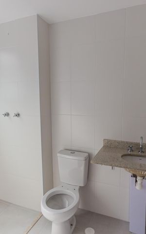Apartamento à venda com 64m², 2 quartos e 2 vagas Apartamento à venda com 64m², 2 quartos e 2 vagasBanheiro da Suíte