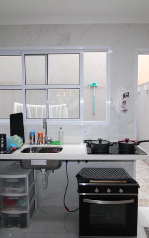 Casa à venda com 100m², 3 quartos e 2 vagasSala/Cozinha
