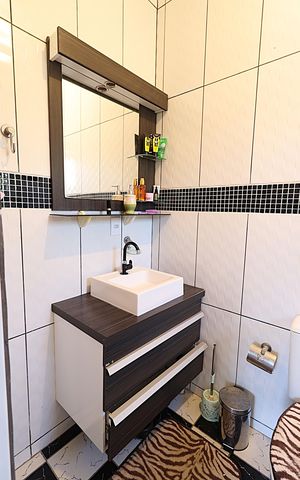 Casa para alugar com 200m², 4 quartos e 6 vagasBanheiro da Suíte 1