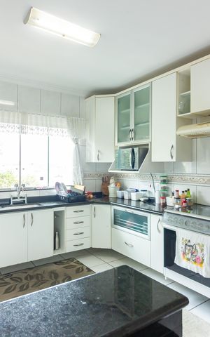Casa à venda com 250m², 3 quartos e 6 vagas Casa à venda com 250m², 3 quartos e 6 vagasCozinha