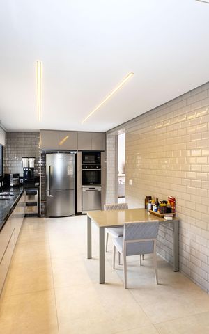 Casa de condomínio à venda com 450m², 4 quartos e 4 vagas Casa de condomínio à venda com 450m², 4 quartos e 4 vagasCozinha