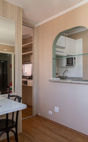 Studio à venda com 28m², 1 quarto e 1 vaga Studio à venda com 28m², 1 quarto e 1 vagaSala