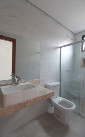 Casa de condomínio à venda com 140m², 3 quartos e 2 vagasBanheiro da Suite