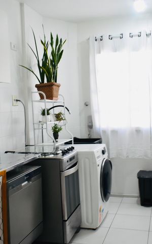 Apartamento à venda com 114m², 2 quartos e 2 vagas Apartamento à venda com 114m², 2 quartos e 2 vagasCozinha e Área de Serviço