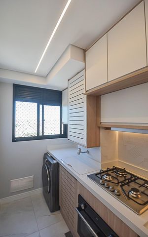 Apartamento à venda com 44m², 2 quartos e 1 vaga Apartamento à venda com 44m², 2 quartos e 1 vagaCozinha e Área de Serviço