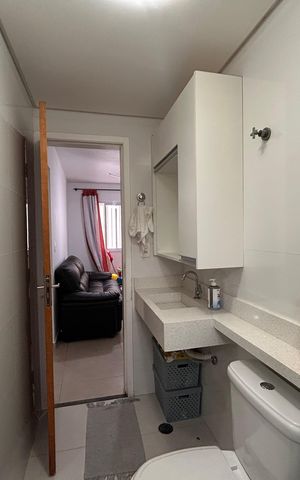Apartamento à venda com 58m², 2 quartos e 1 vaga Apartamento à venda com 58m², 2 quartos e 1 vagaBanheiro Social