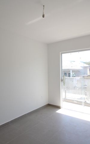 Casa de condomínio à venda com 81m², 2 quartos e 1 vagaSuíte 2