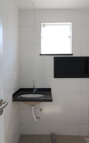 Casa de condomínio à venda com 81m², 2 quartos e 1 vagaSuíte 2 - Banheiro