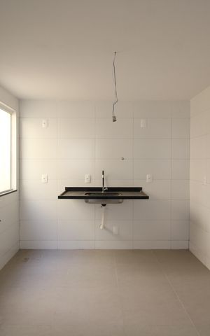 Casa de condomínio à venda com 81m², 2 quartos e 1 vagaCozinha