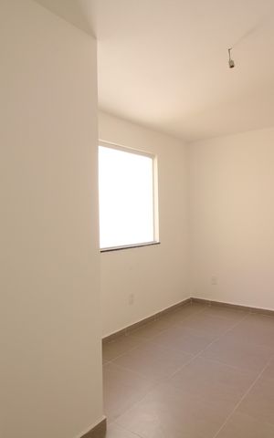 Casa de condomínio à venda com 81m², 2 quartos e 1 vagaSuíte 1