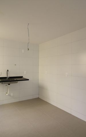 Casa de condomínio à venda com 81m², 2 quartos e 1 vagaCozinha