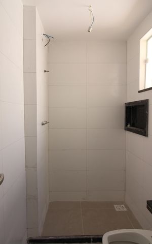 Casa de condomínio à venda com 81m², 2 quartos e 1 vagaSuíte 1 - Banheiro