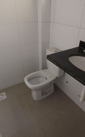 Casa de condomínio à venda com 81m², 2 quartos e 1 vagaLavabo