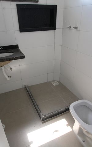 Casa de condomínio à venda com 81m², 2 quartos e 1 vagaSuíte 2 - Banheiro