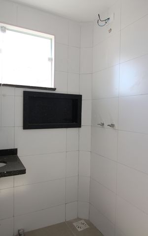 Casa de condomínio à venda com 81m², 2 quartos e 1 vagaSuíte 2 - Banheiro