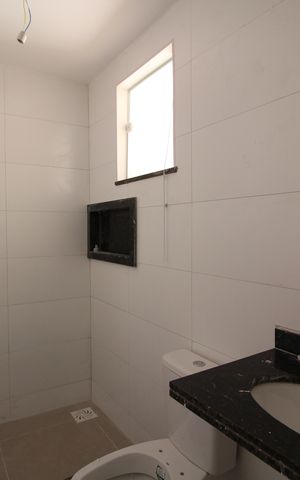 Casa de condomínio à venda com 81m², 2 quartos e 1 vagaSuíte 1 - Banheiro