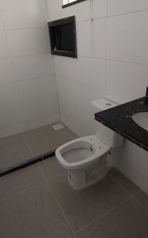 Casa de condomínio à venda com 81m², 2 quartos e 1 vagaSuíte 1 - Banheiro