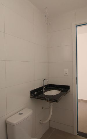 Casa de condomínio à venda com 81m², 2 quartos e 1 vagaSuíte 1 - Banheiro