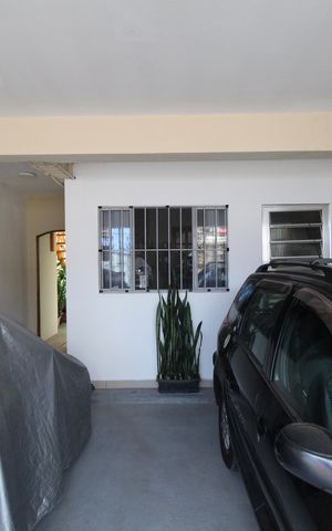Casa à venda com 316m², 4 quartos e 2 vagasGaragem