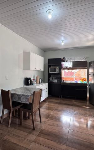 Casa à venda com 90m², 2 quartos e 2 vagas Casa à venda com 90m², 2 quartos e 2 vagasSala/Cozinha